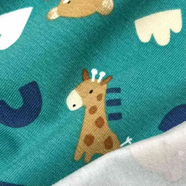 Tissu jersey coton élasthanne Girafe / ourson turquoise